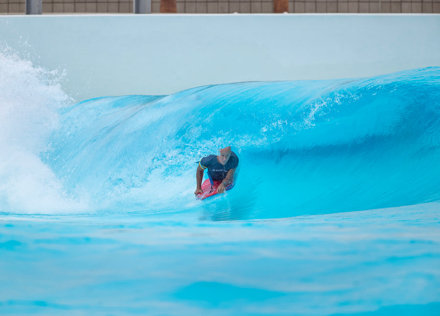 Jay Reale riding his Tribe Wolf bodyboard in a wave pool barrel